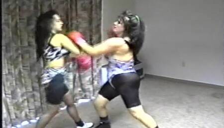 Hard Hitting Female Boxing With Rock-em Sock-em Punches To Head And Body