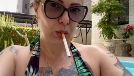 Smoking my Marlboro reds 100s in the pool, no smoking area - Deep Inhales - Multiple pumps - Nose exhales - Mouth Inhales - Mouth exhales - Long red nails
