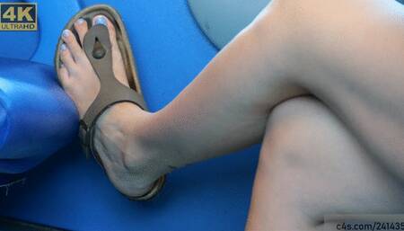 Candid birkenstock beauty feet and legs on train seat