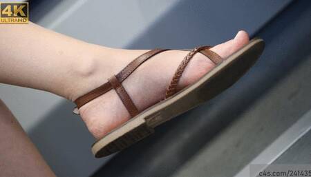 Candid foot fetish, beauty feet in sandals and crossed legs