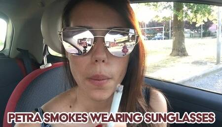 Petra smokes wearing sunglasses - FULL HD