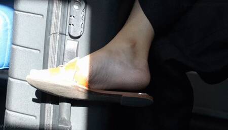 Candid dangling and shoeplay with flat slippers, beauty woman feet to admire