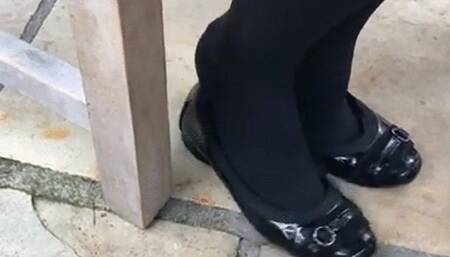 Shoeplaying under my chair whilst chatting to my mum