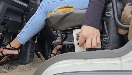 Katherine pedal pumping and driving a huge truck on sexy black heels
