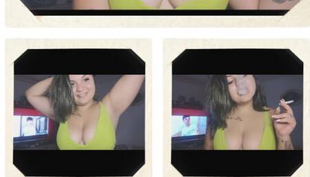 the girl smoking in her green bra