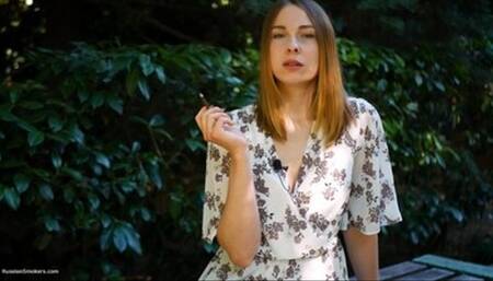 Evgeniya is smoking strong 120mm cigarette