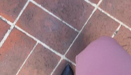 Feet rubbing  hard in her pant suit