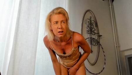 Standing masturbation in golden bodysuit