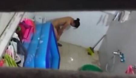 Asian stepdaughter spied in the bathhouse