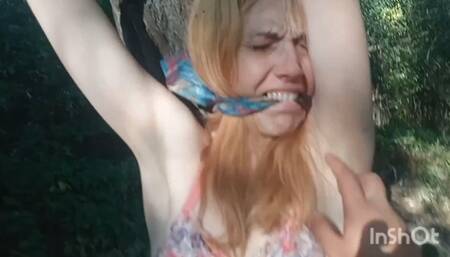 Tickling a tied-up bitch