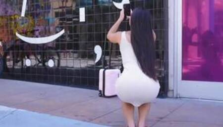 Kay Lovely and Kimmy Kimm on a white coloured bed in several lesbian scenes together