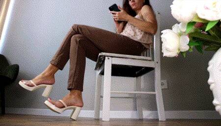 Toe tapping in brown pants and platform sandals WMV