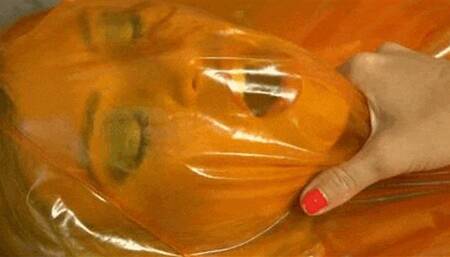 Lustful orange plastic fetish lover slut