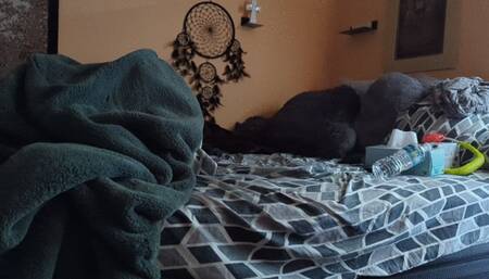 Naejae laying in bed playing with pussy