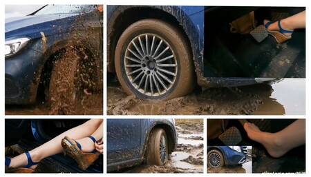 SEXY PREMIERE: Real estate got her Mercedes stuck in deep soft mud