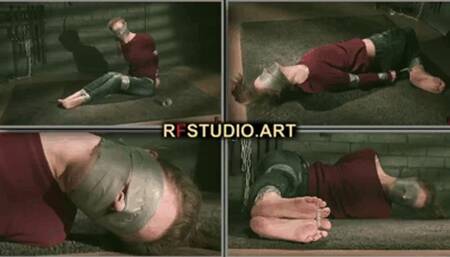 Leya in a sticky situation - Struggle and deprivation in the tight embrace of tape - Part 2 (HD 720p MP4)