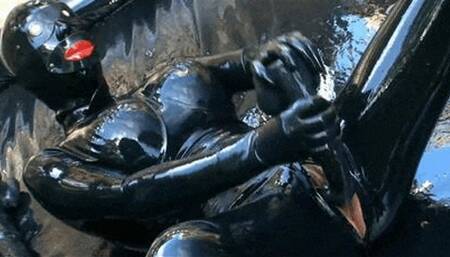 Messy latex encasement girl and the heavy rubber sploshing outdoor session - Part 2 of 2
