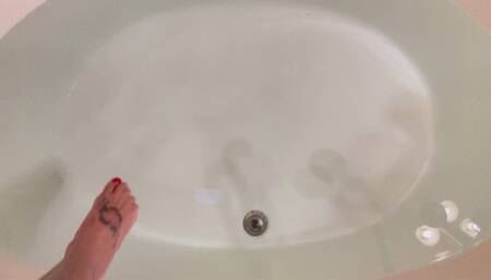 Gold bikini, gold ball gag, and magical fingers!