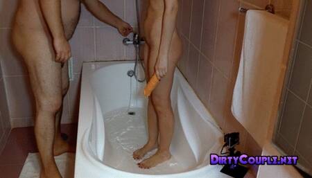 Strange couple begins their fling in the bathtub before moving on to the living room