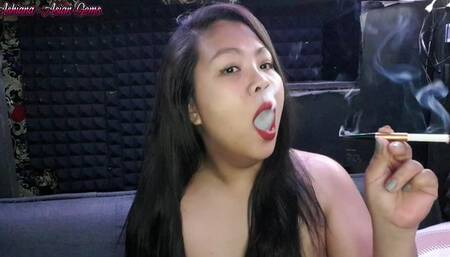 Chainsmoke unfiltered Marlboro Red with a holder