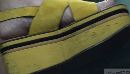 Adorable female feet with sole shape sign imprinted under feet heel, toenails fetish close-up