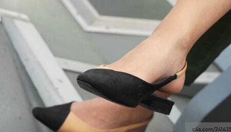 Candid elegant flat sandals with cute arched feet to foot fetish