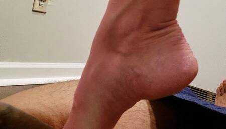 Light ballbusting and crush while she makes dinner