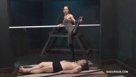 Under Mistress Nomi's boots