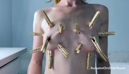 Clothes pin masochistic breast play