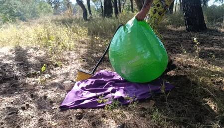 blow with feet pump gymball in forest