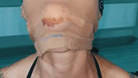 Nylon stockings and ball gagged