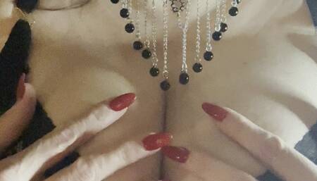 Playing with my boobies.