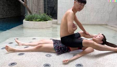 CR151_Sitting on the belly of the bikini goddess in the fountain