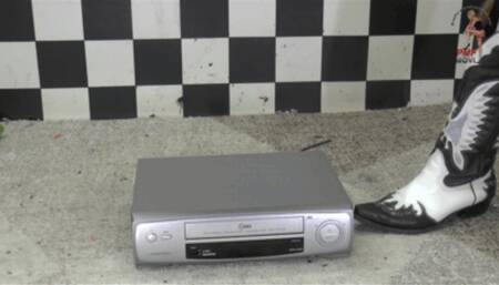 VCR Player under Cowgirl Boots