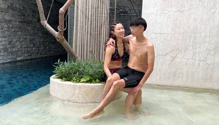 CR151_Sitting on the lap of a bikini goddess on the pool