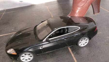 Jaguar XJ6 Crushed Under Katie's Leather Boots