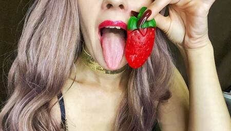 Cute fairy found a berry in the form of a tongue