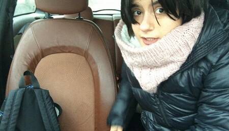 stuck between the seats in his car