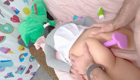 Shy college student lays on her belly and gets fucked while her ass is plugged