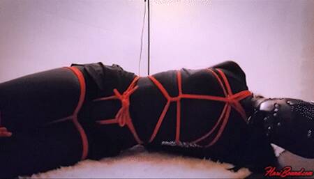 Black workout catsuit girl bound and gagged