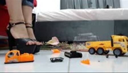 Crushing a Truck with Digger in my Guess Flipflops and my sexy Platform Heels