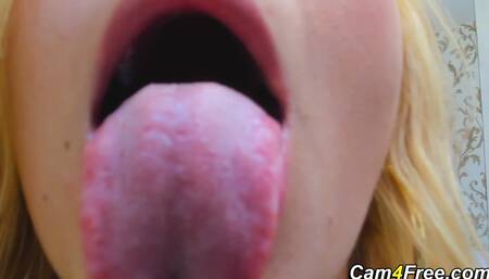 Blonde swallows rubber cock and gags hard