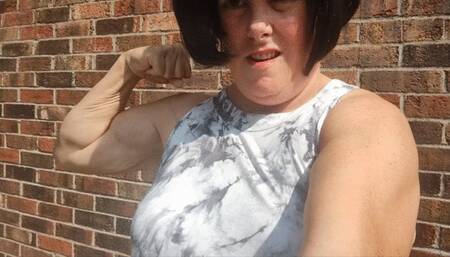 Tempest flexing by the brick wall