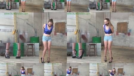 Bound in heavy metal & challenged to stand in six inch stiletto heels (MP4 SD 3500kbps)