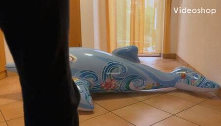 2 girls vs inflatable dolphin