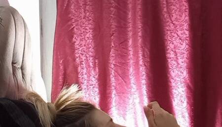 I lie in bed and light a cigarette