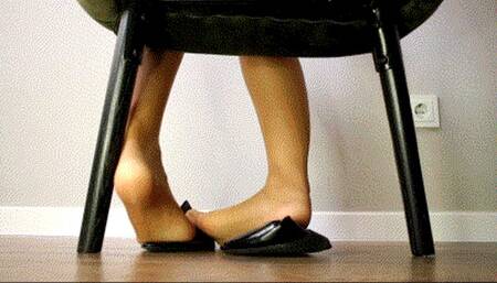 Nylon feet play with black ballet flats