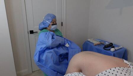 Doctor wears surgical PPE and performs anal exam with speculum