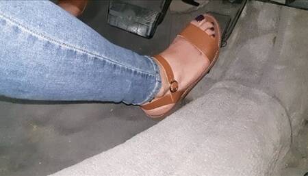 Brown sandals driving