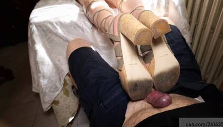 Girl rest her sandals on men cock while shie is in realxing on sofa